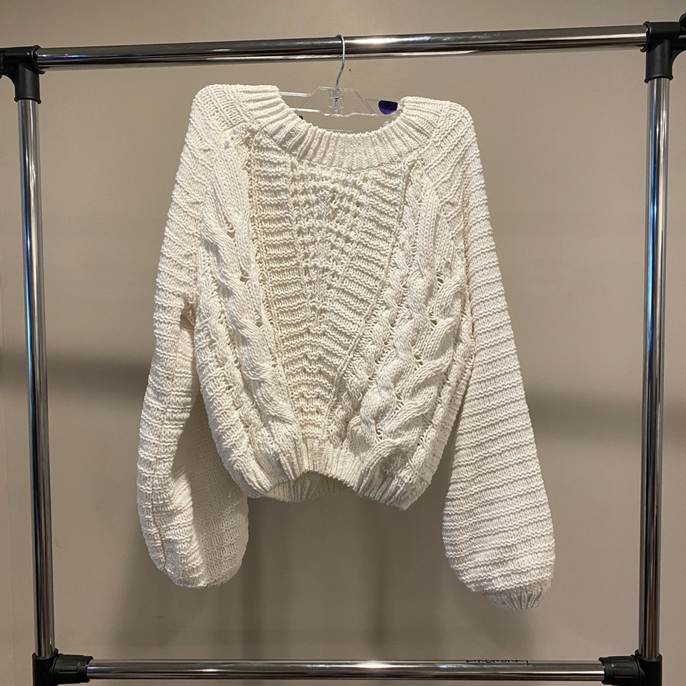 Francesca’s white chunky knit sweater